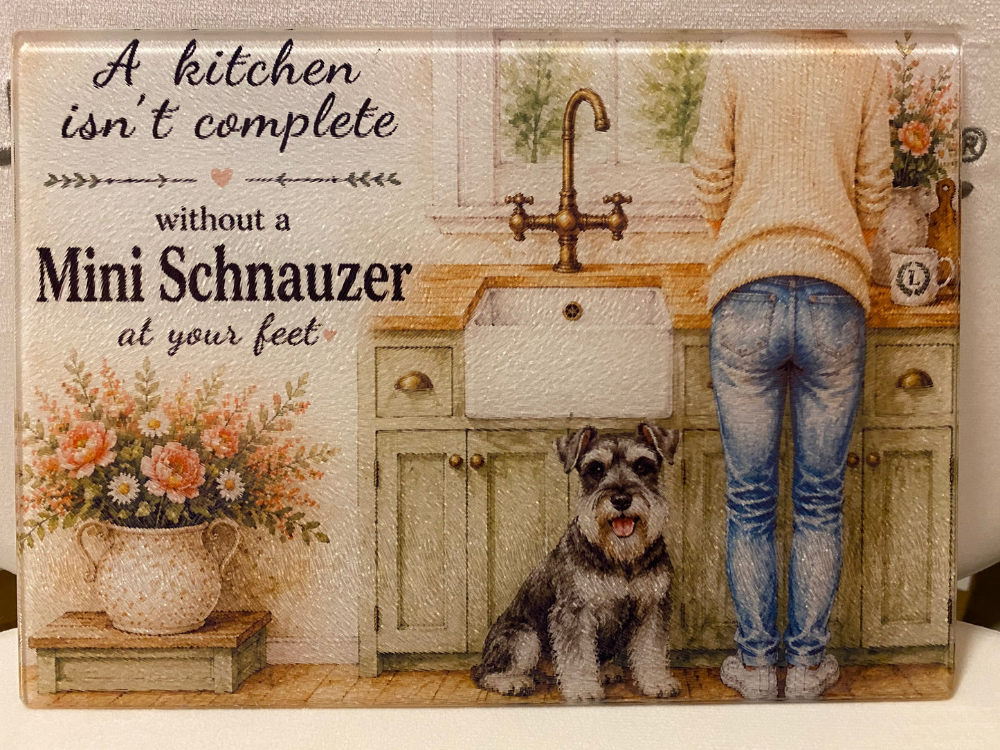 A Kitchen Isn't Complete Without A _____ At Your Feet - Mini Schnauzer