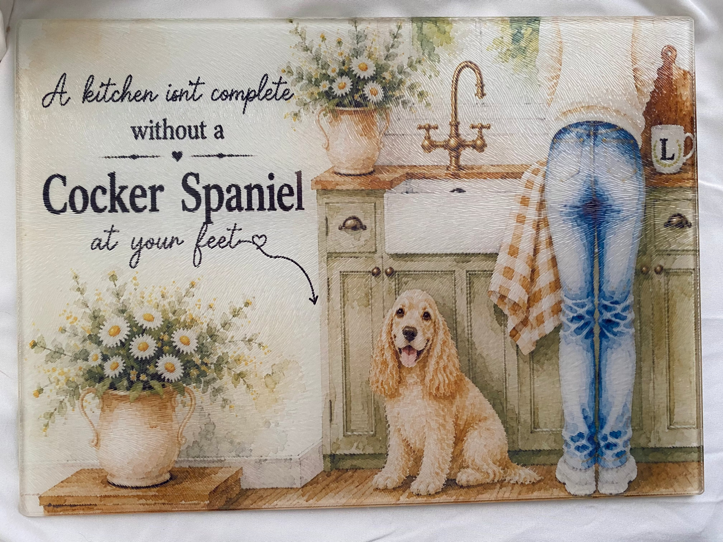 A Kitchen Isn't Complete Without A _____ At Your Feet - Cocker Spaniel