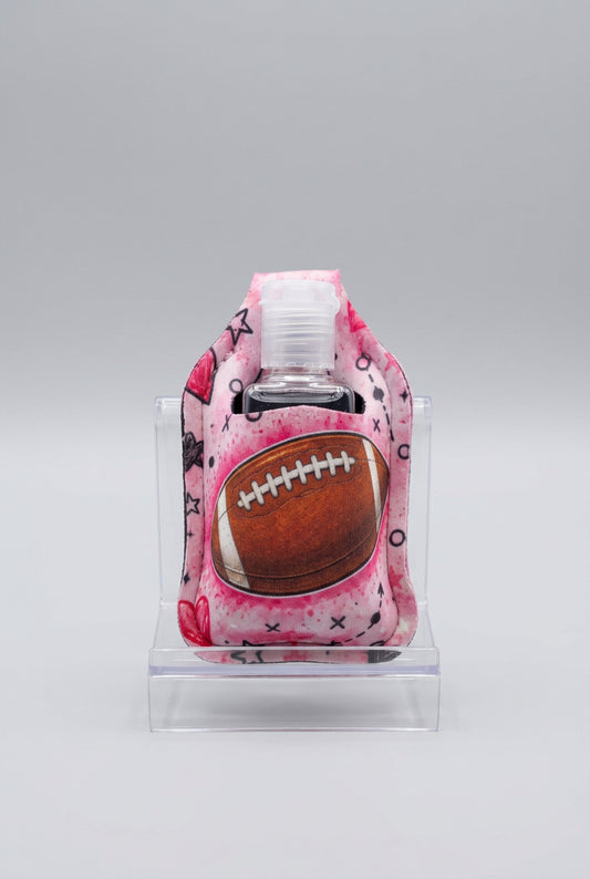 Pink Football hand sanitizer holder with refillable bottle